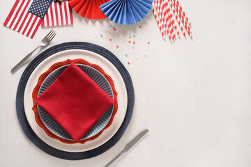 Festive table setting and decoration in American flag colors on white background. Independence Day....