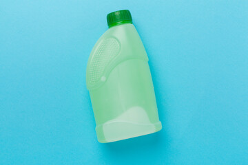 Can with antifreeze on color background, top view
