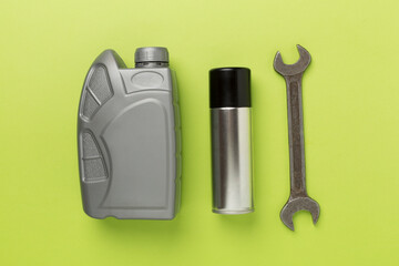 Automobile products and tools on color background, top view