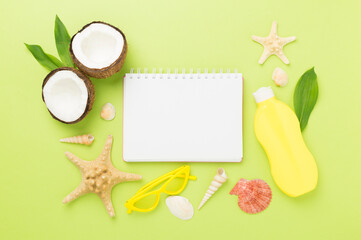 Summer banner with coconut and sea shells on color background. Vacation concept