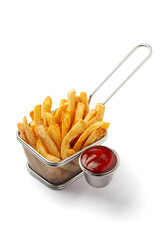 Close-up of golden potato Crispy french fries served in the basket with red tomato ketchup. Isolated on a white background.