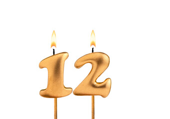 Golden candle number 12 - Birthday on white background