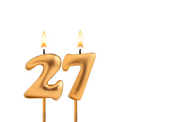 Birthday number 27 - Golden candle on white background