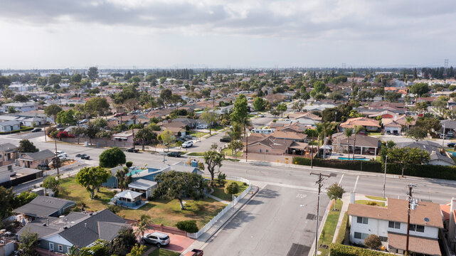 Paramount, California, USA - May 2, 2021: Afternoon sun shines on a neighborhood near downtown Paramount.