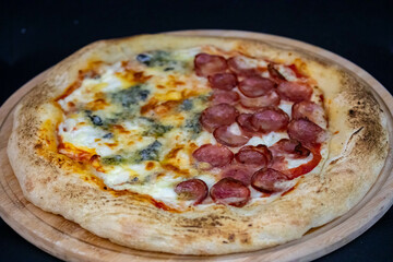Traditional Brazilian style pizza, half flavored with four cheeses and half pepperoni on long-matured artisanal dough