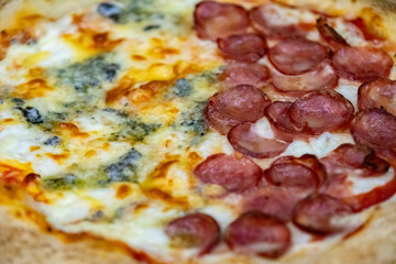 Traditional Brazilian style pizza, half flavored with four cheeses and half pepperoni on long-matured artisanal dough