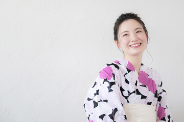 Beautiful Japanese woman posing in yukata