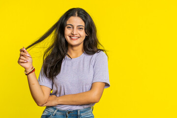 Cheerful lovely happy young Indian woman smiling friendly glad expression looking at camera...