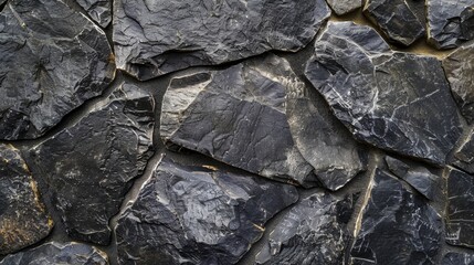 Background Stone,Polished basalt background with ample space for text or product placement.