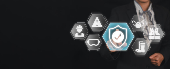 Work safety concept, Businesswoman hand touching Work safety icon on virtual screen, First secure rules. regulations and standard in industry,Health protection.