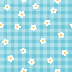 Cute fashion seamless pattern in style of picnic. Scottish tartan Vichy plaid with ditsy flowers, print for fabric, wrapping paper, package, banner, card. Classic textile print vector background.