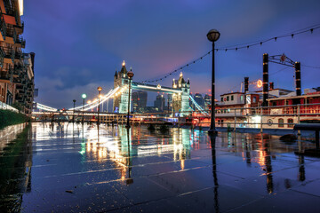 Tower Bridge on rainy night in London. England