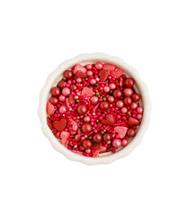 Bowl with sweet pink sprinkles on white background
