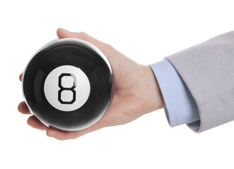 Man holding magic eight ball on white background, closeup