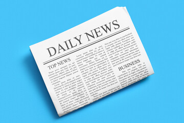 Fototapeta premium Daily newspaper on blue background