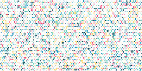 Seamless polka dot pattern with circles of fresh colors on a white background