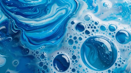 : Vibrant abstract design featuring blue and white soap bubbles in paint, perfect for backgrounds.