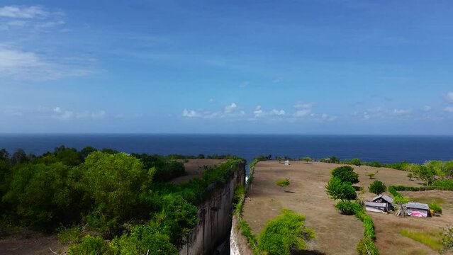 Aerial view of Tanah Barak cliffs, A must-visit viral hidden gem tourist destinantion in South Kuta, Bali, Indonesia