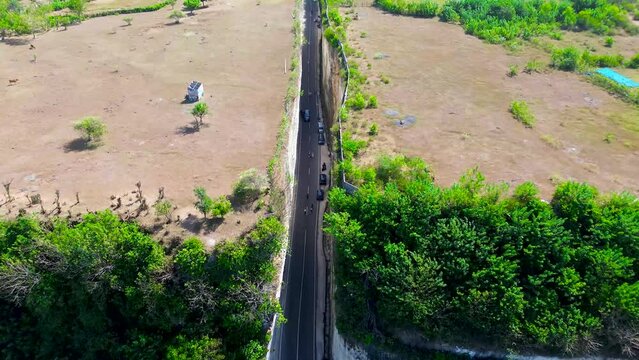 Aerial view of Tanah Barak cliffs, A must-visit viral hidden gem tourist destinantion in South Kuta, Bali, Indonesia