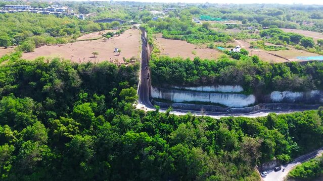 Aerial view of Tanah Barak cliffs, A must-visit viral hidden gem tourist destinantion in South Kuta, Bali, Indonesia