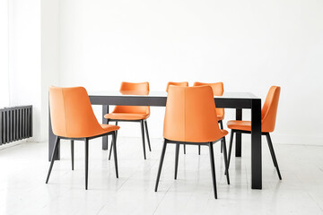 Modern Dining Room Set with Orange Chairs and Glass Table