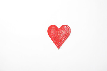 Obraz premium Red Heart Drawn on White Background