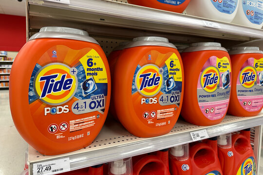 Tide laundry detergent pods at display shelf aisle at local Target store.