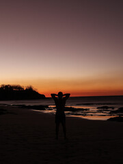 Fototapeta premium silhouette of a person at sunset