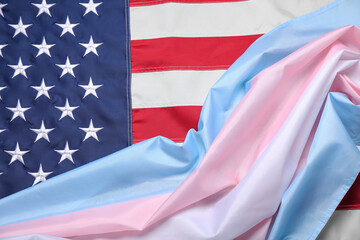 Texture of transgender and USA flags as background