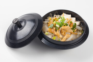  Soup made by tearing dried dried pollack into small pieces, adding green onions, and beating an egg.