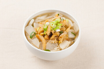  Soup made by tearing dried dried pollack into small pieces, adding green onions, and beating an egg.