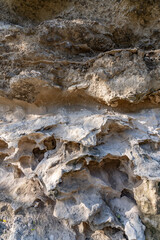 Alluvium / Sand and gravel, Salt weathering / Alcove (landform) Older dune deposits / Sand dunes / Well-sorted calcareous sand, Diamond Head Rd, Honolulu Oahu Hawaii geogoly.  two Stratum