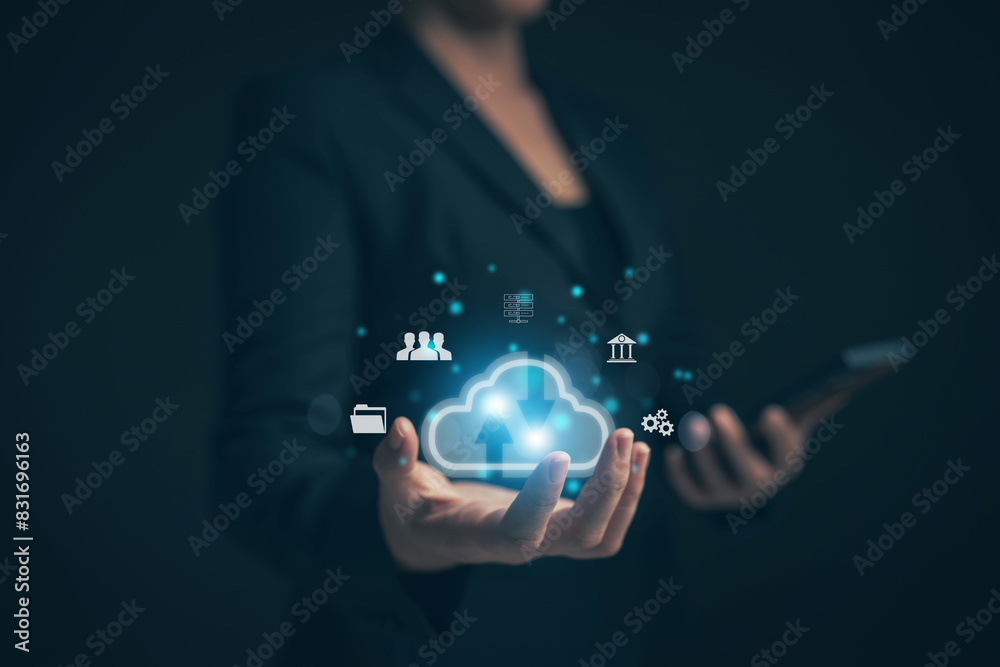 Poster businessman uses a tablet. cloud computing disk is displayed on his hand. cloud technology data stor