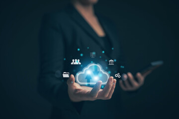 Businessman uses a tablet. Cloud computing disk is displayed on his hand. cloud technology Data storage Concept of internet service network and financial data transfe