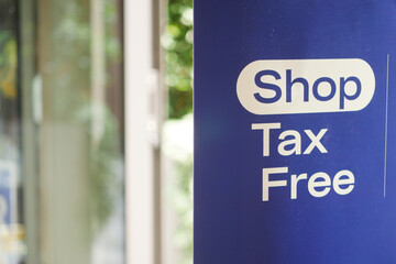 shop tax free text duty free shop sign on shop window 