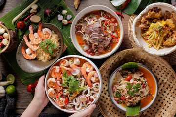 Traditional Thai food on black background, oriental food concept. Top view, flat lay, panorama.