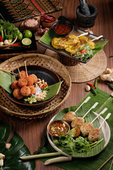 Traditional Thai food on black background, oriental food concept. Top view, flat lay, panorama.