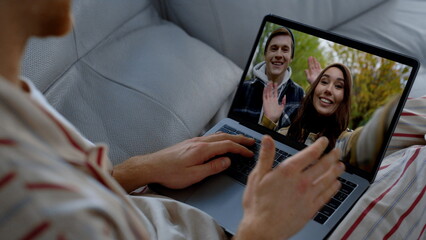 Smiling friends video calling online. Happy people enjoying web cam conference