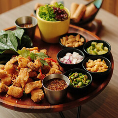 A big dinner party with a small group of friends. From many nationalities come to celebrate at this restaurant.