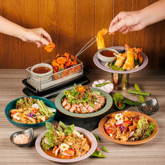 A big dinner party with a small group of friends. From many nationalities come to celebrate at this restaurant.