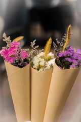 Group of friends or family members on Thanksgiving at the turkey dinner table together. Thanksgiving celebration, traditional dinner concept.