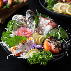 Cropped Image Of Hand Taking Sauce from sukiyaki shabu shabu japanese food buffet.