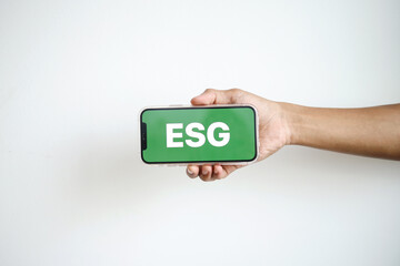 Hand Showing Smartphone Display ESG Screen. Environmental Social Governance. 