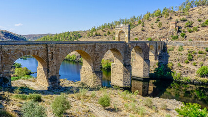Roman Bridge of Alc&aacute;ntara, Roman bridge restored and rehabilitated over the centuries, with elegant arches and views of the Tagus River.