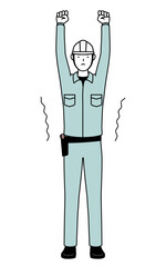 Man in helmet and workwear stretching and standing tall.