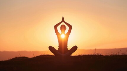 Inspiring Yoga Practice at Sunrise: Silhouette of a person in a meditative pose