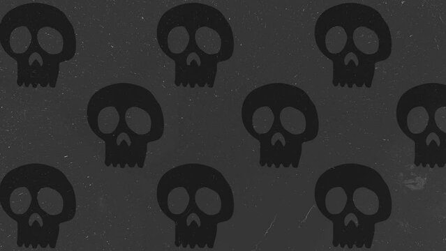 Halloween Background animation large neutral black skulls moving to the left over gray background