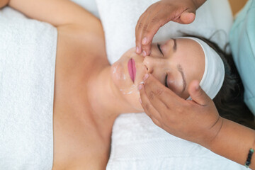 Facial peeling massage in a wellness spa