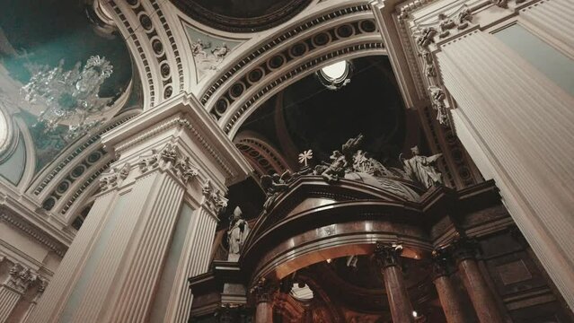 wide view of decorated top of chapel inside christian church in Zaragoza Spain