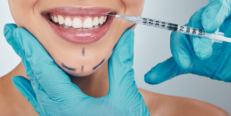 Lip filler, syringe and plastic surgery with smile in studio for change, cosmetics and gloves on...